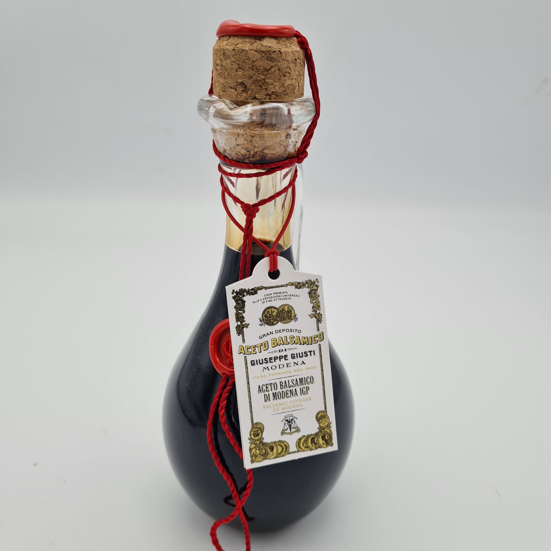 Balsamico-2-munten-uit-Modena-in-cadeau-verpakking-1 Balsamico 2 munten uit Modena in cadeau verpakking 1